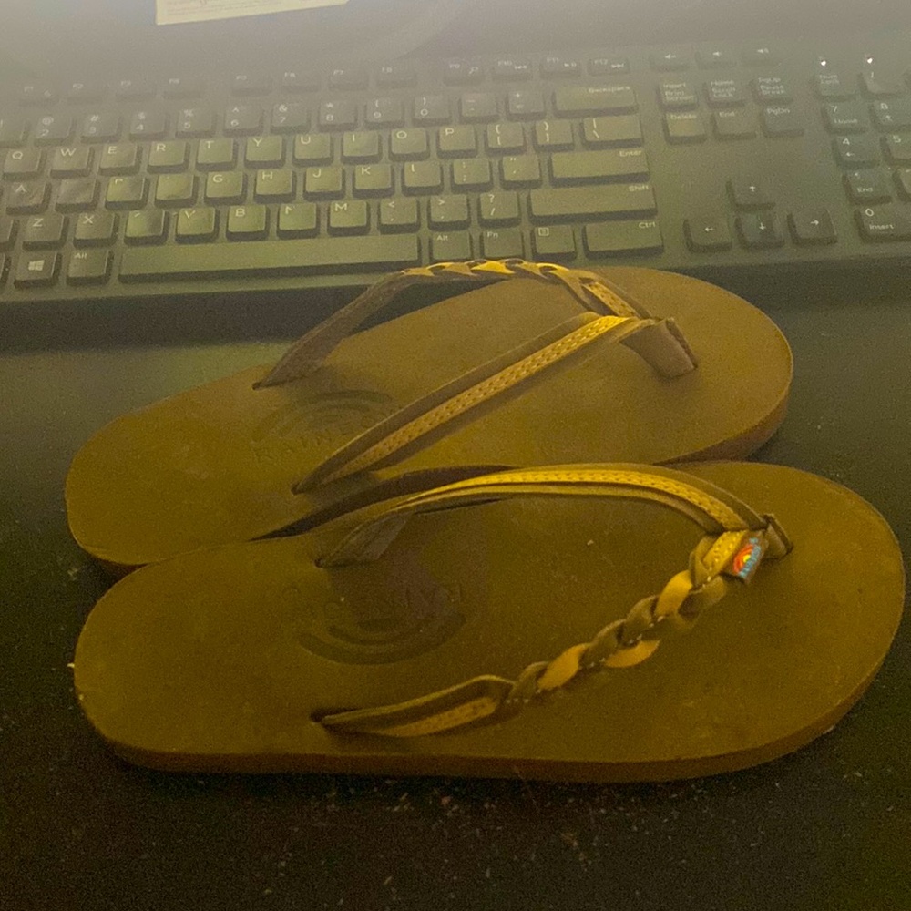 Brand New never worn Rainbow leather flip flops. Women’s size small (5.5-6.5)